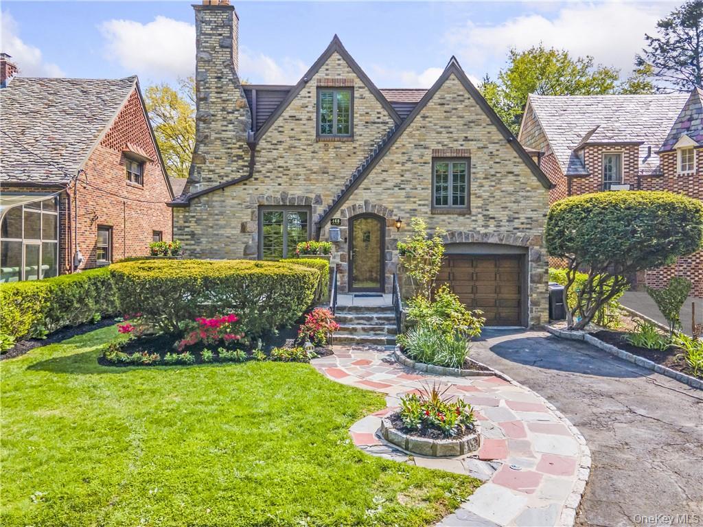 Live your own fairytale! This lovely custom English Tudor located in P...