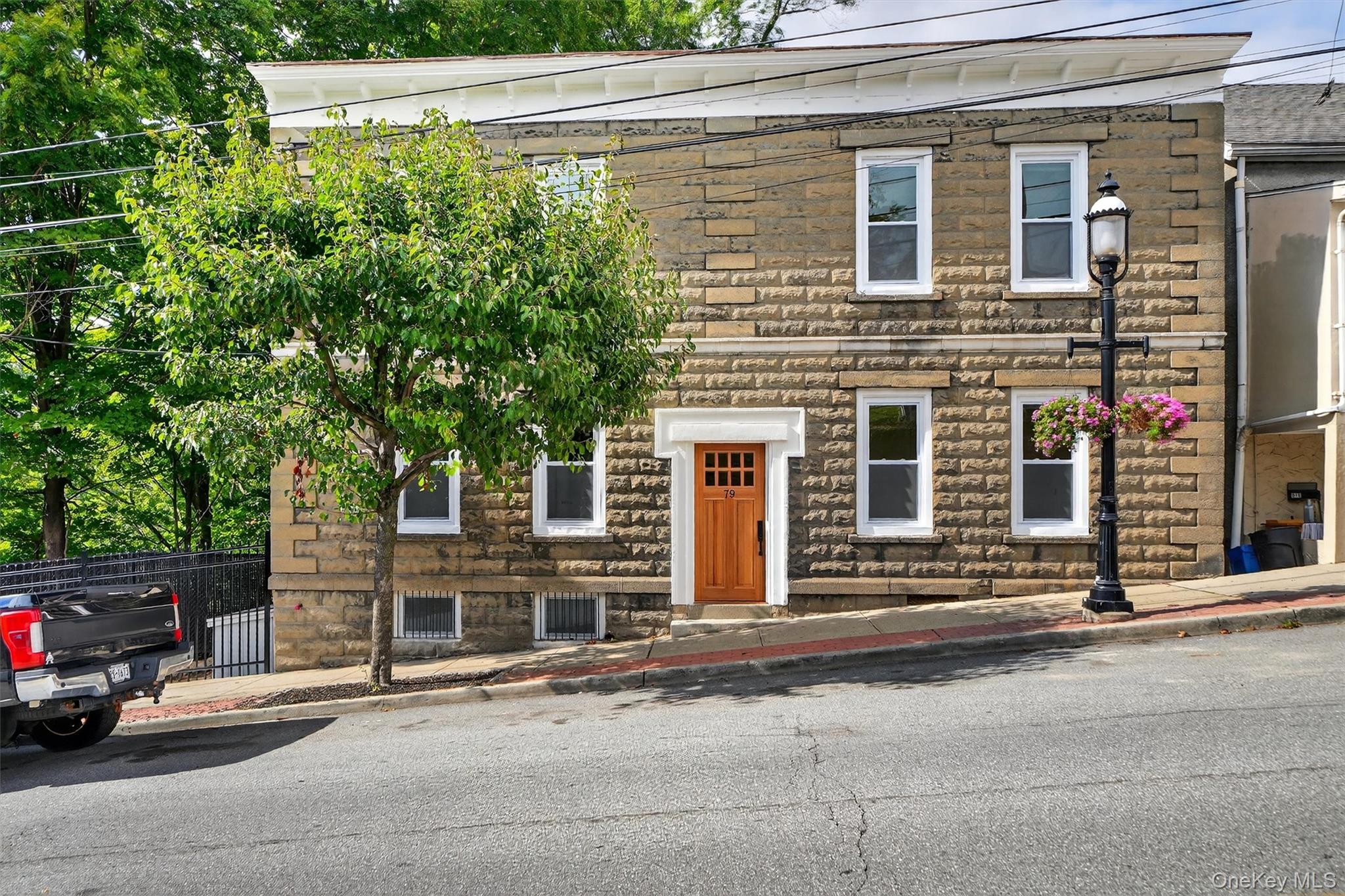 Completely renovated in 2025, this charming second-floor two-bedroom,...