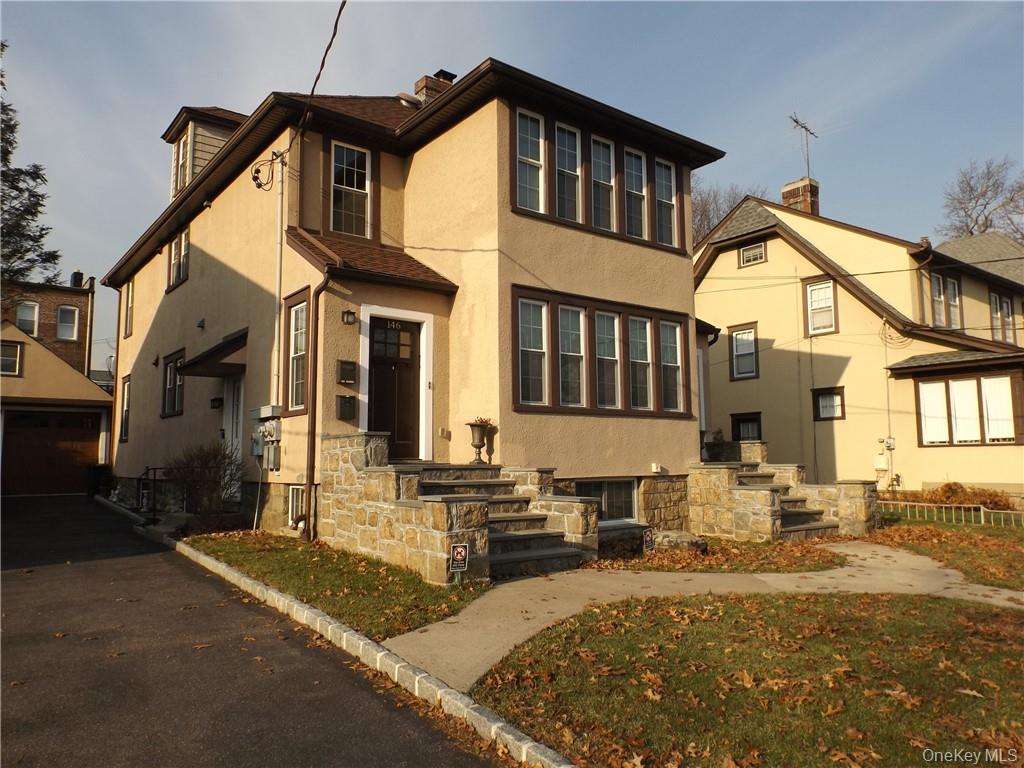 Welcome to this beautiful three-bedroom, two- bathroom multi-family fi...