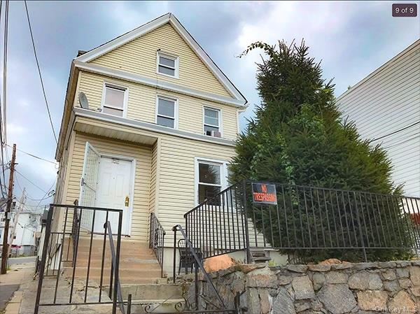 Bright and spacious 2-bedroom, 1.5-bath residence with bonus den — per...