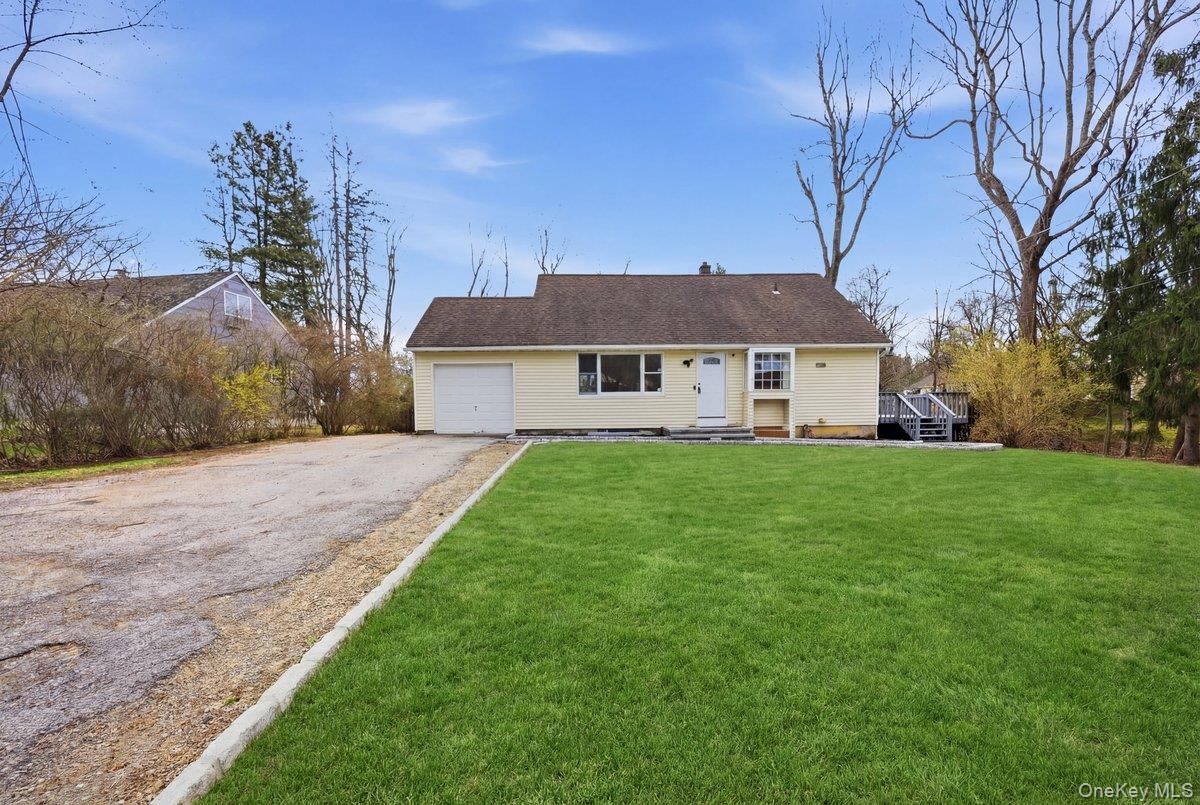 Nestled along a picturesque, tree-lined street on more than a quarter...