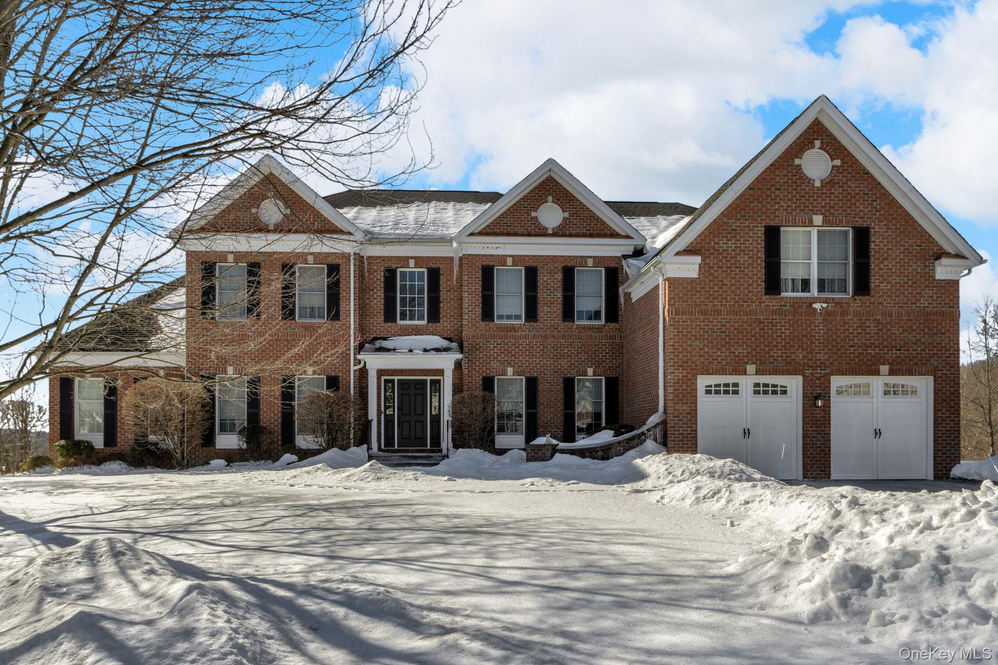 This beautifully renovated brick Colonial blends timeless architecture...