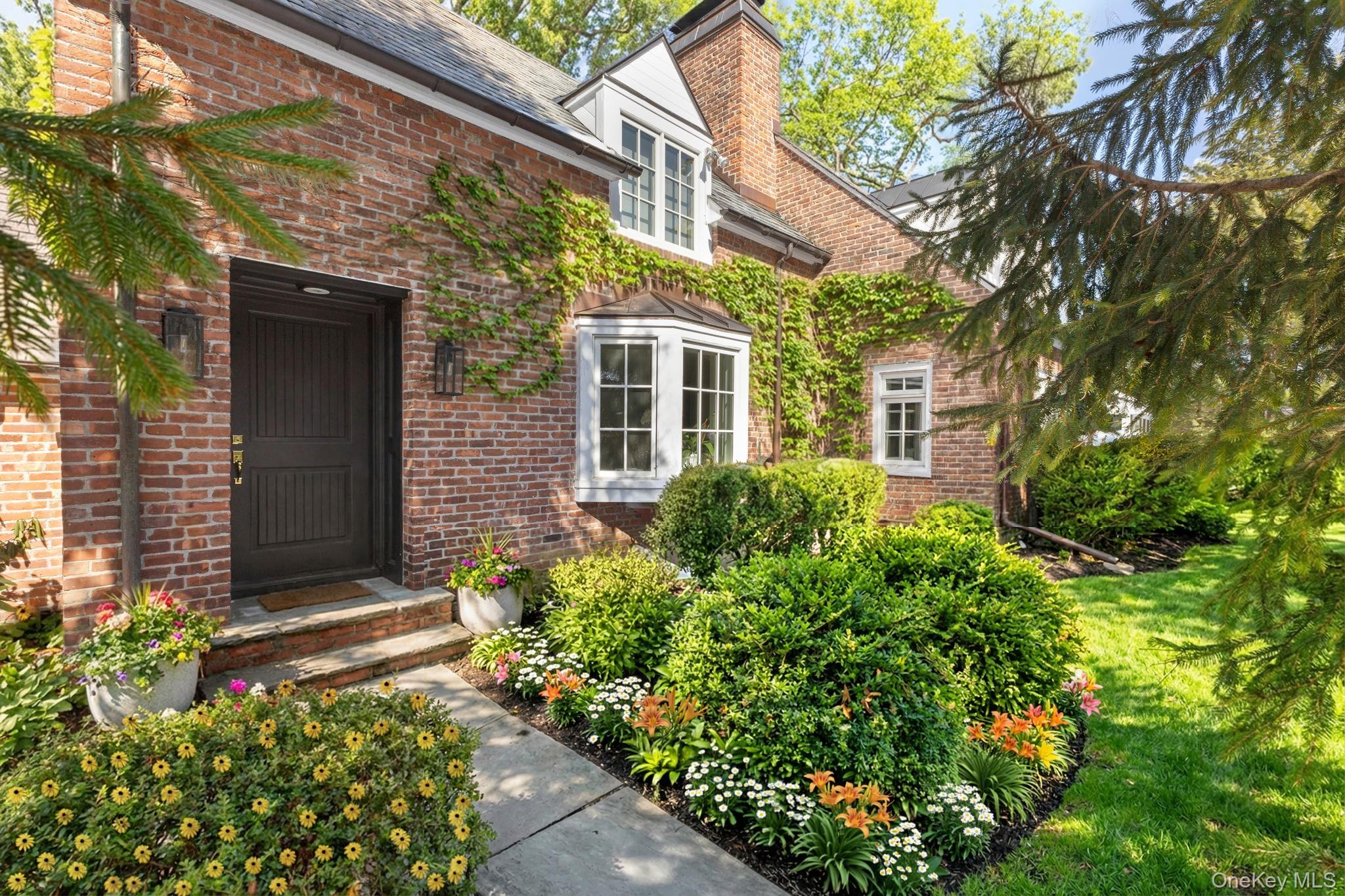 Enter this beautifully renovated Colonial Craftsman and immediately ex...