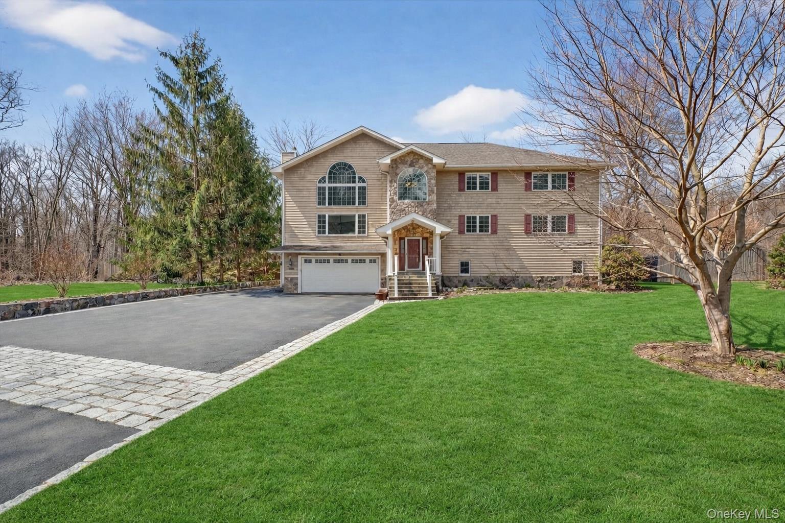 Striking contemporary with open floor plan and refined custom details...