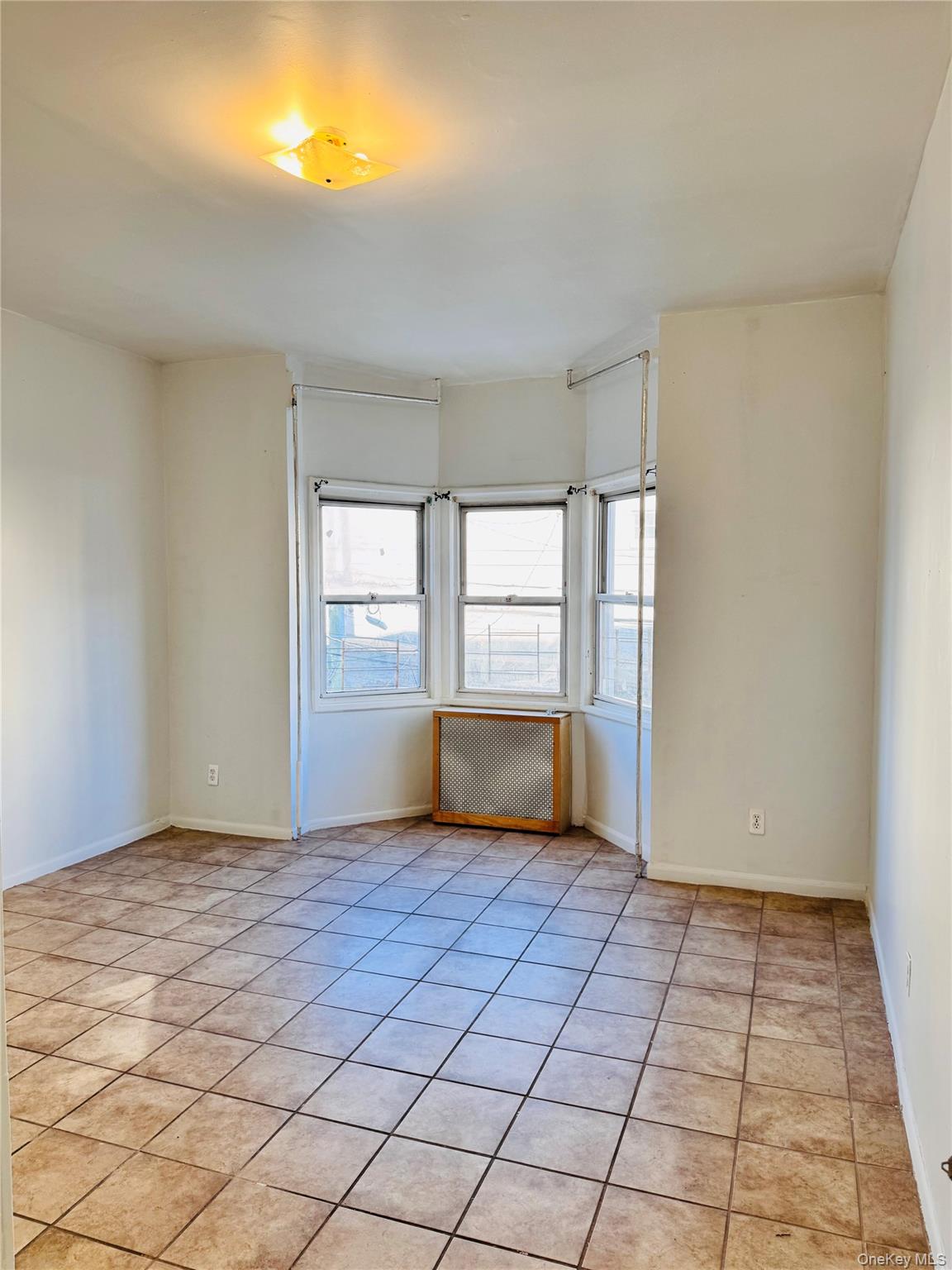 3 Bedroom, 1 bath second floor apartment offering a bright eat in kitc...