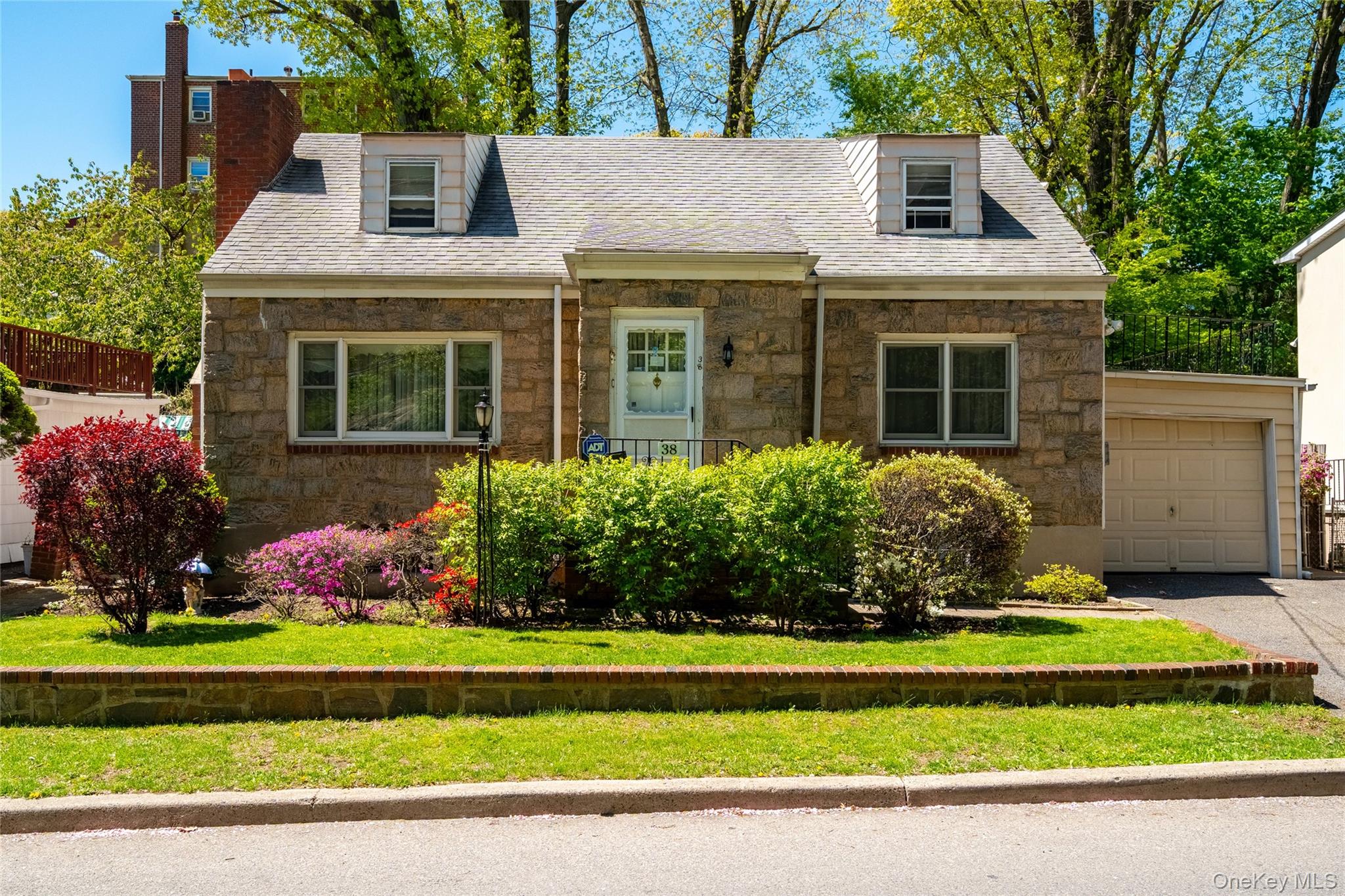 Welcome to 38 Raybrook Road, an expanded Cape Cod-style home located i...