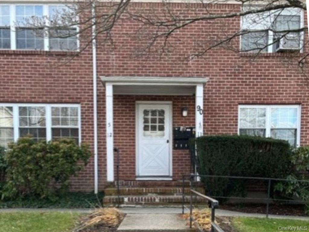 Second floor studio bedroom apartment has wood flooring, light filled...