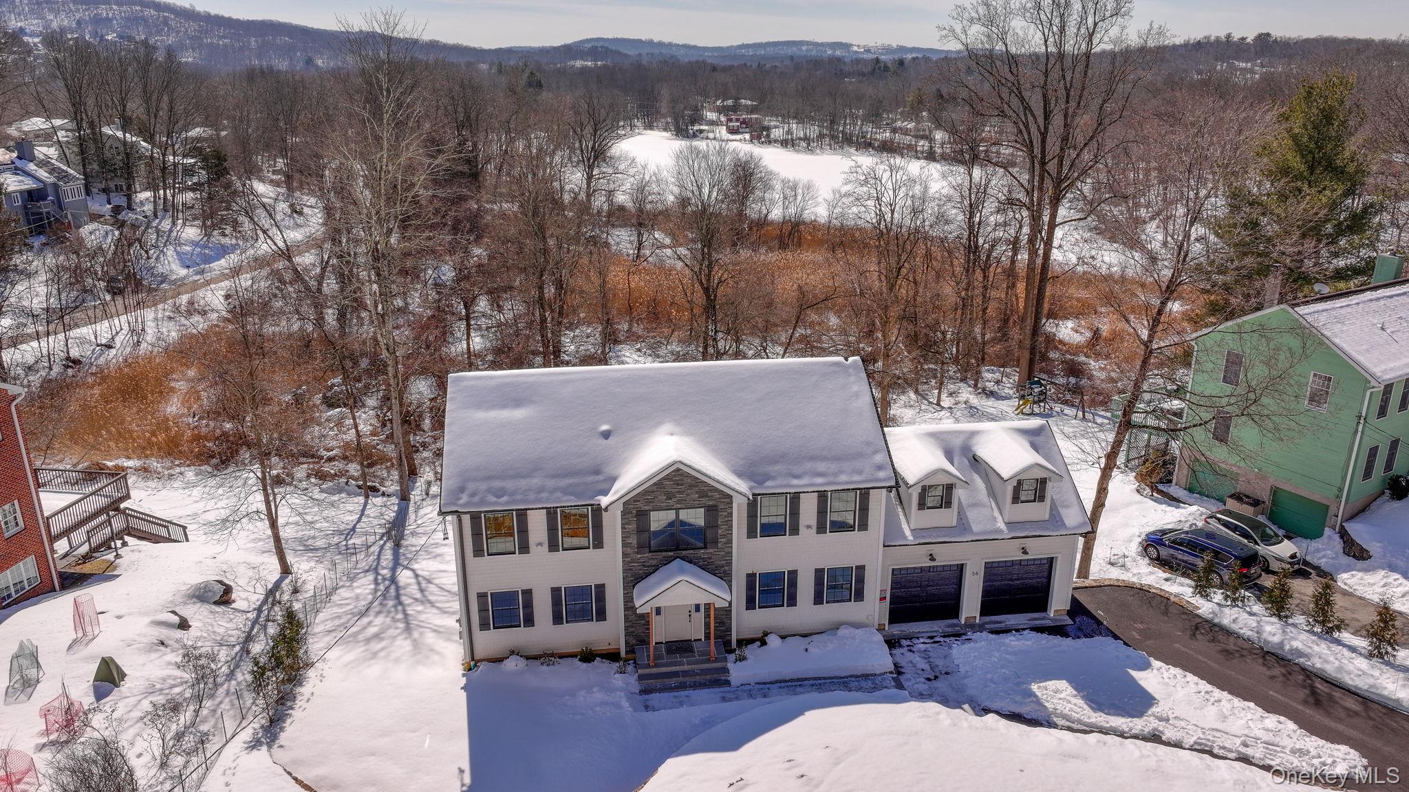 In Cortlandt Manor there is a beautifully custom-built modern Colonial...