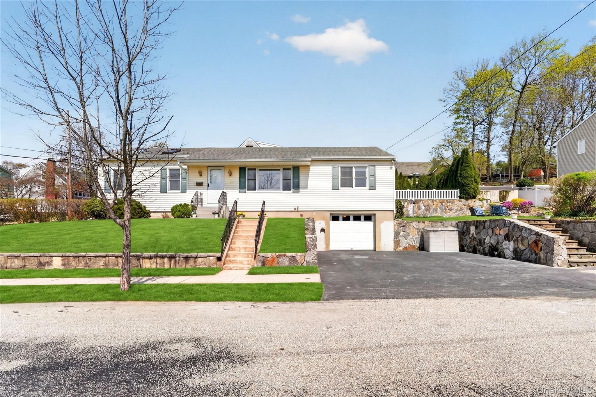 Well-maintained village home set on a desirable corner lot. A ceramic...