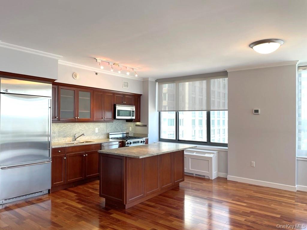 Secure this sought-after corner 2-bedroom unit on the 26th floor now i...