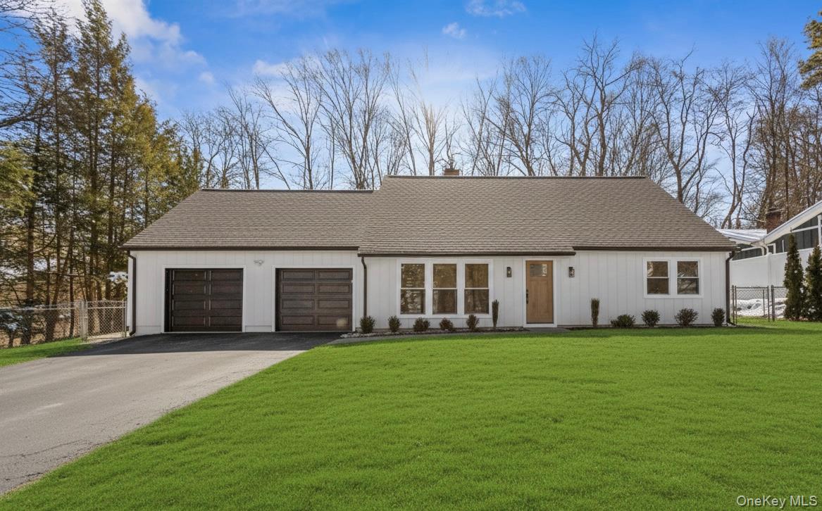 Welcome to this charming contemporary home nestled on a quiet cul-de-s...