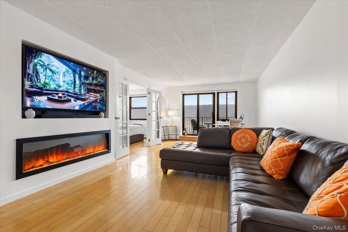 Wake up to sweeping Hudson River views from every window in this beaut...