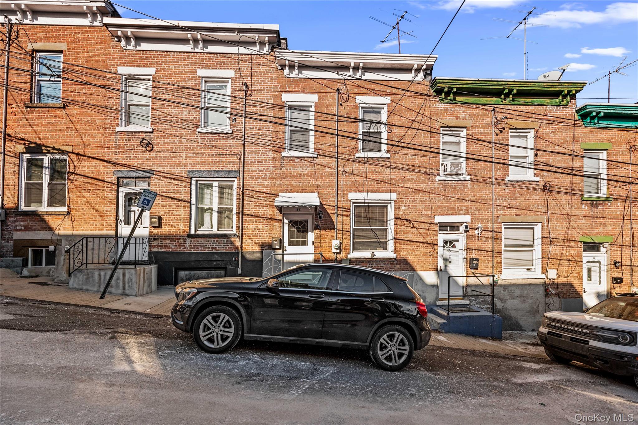Welcome to 37 Moquette Row S, a beautifully fully renovated brick town...