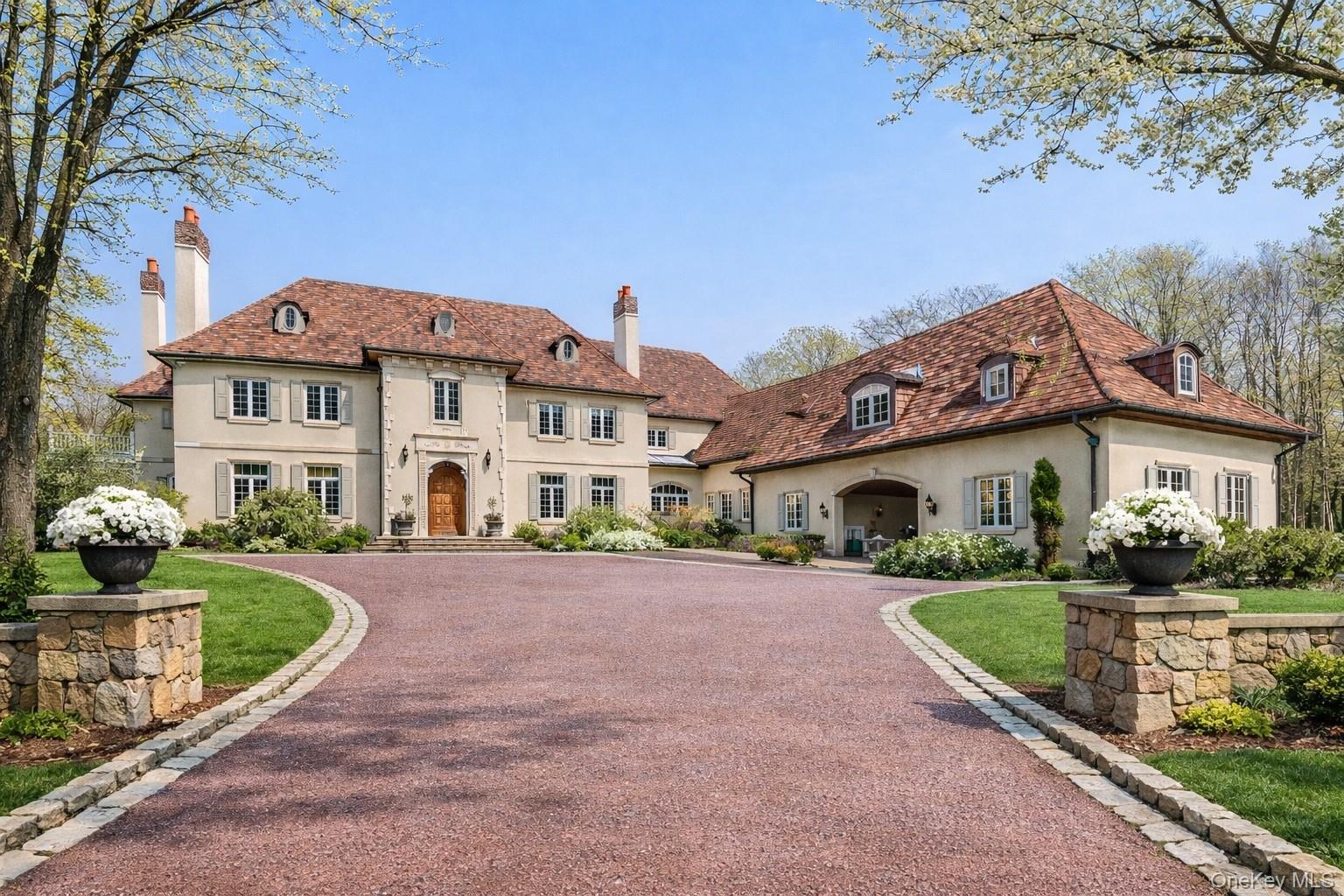 Situated within the gated enclave of Conyers Farm in Armonk/backcountr...