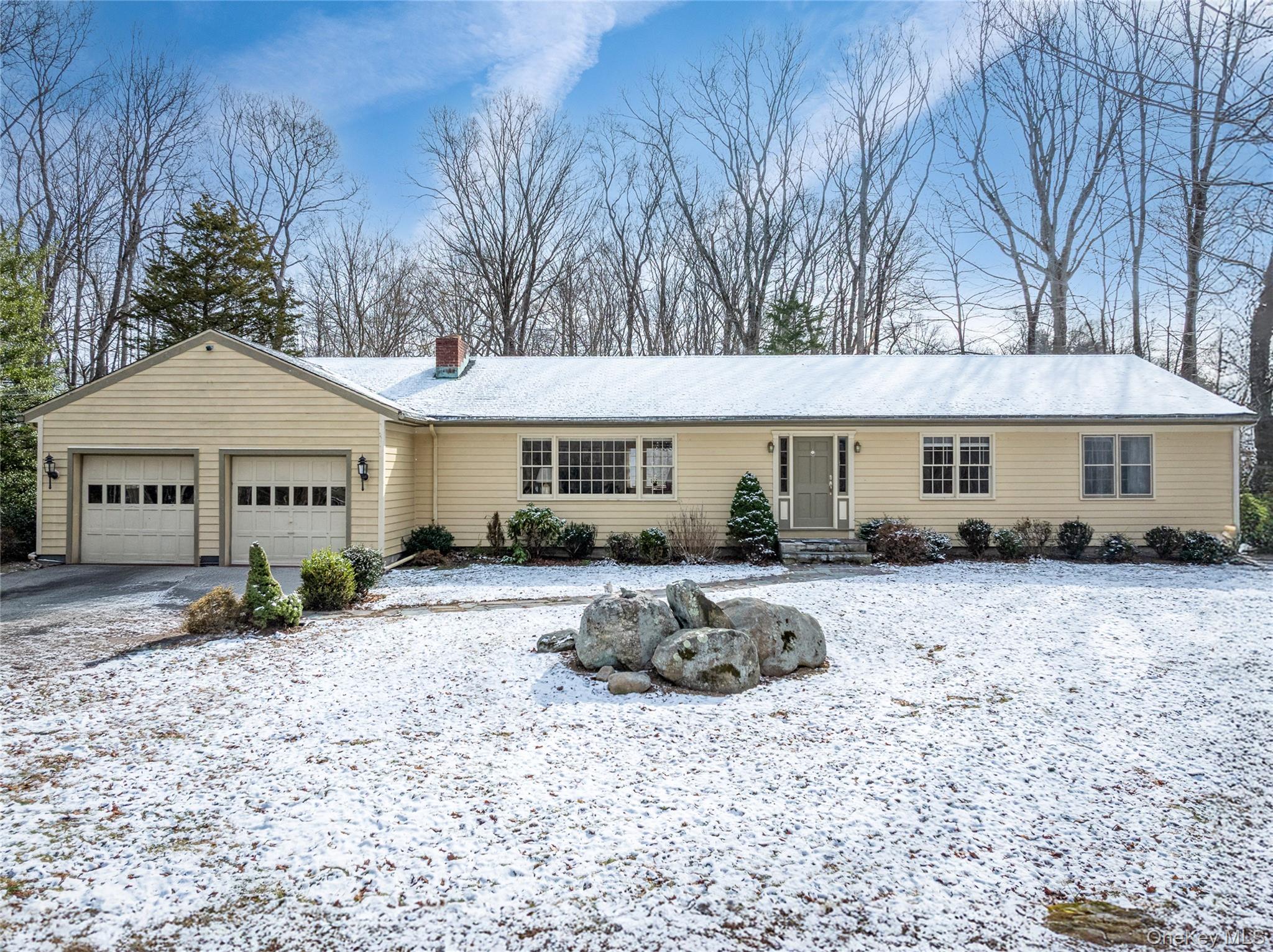 Set on a picturesque 2-acre level lot in South Salem, this charming ra...