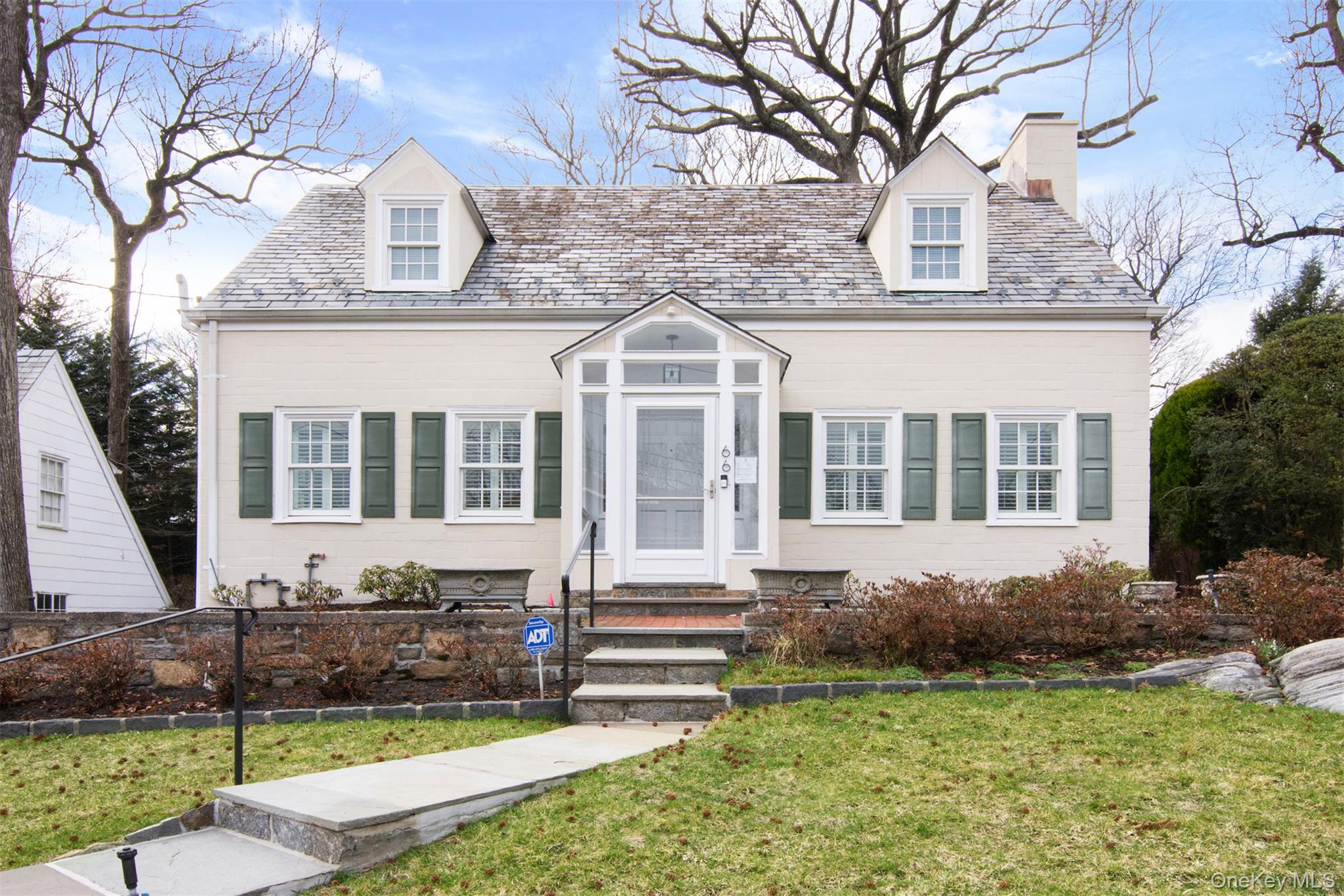 Follow a long, sweeping private driveway to this recently renovated, l...