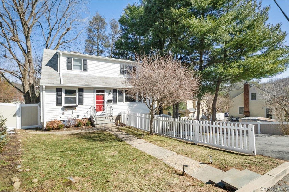 You’ll fall in love with this beautifully updated Cape Cod in the char...