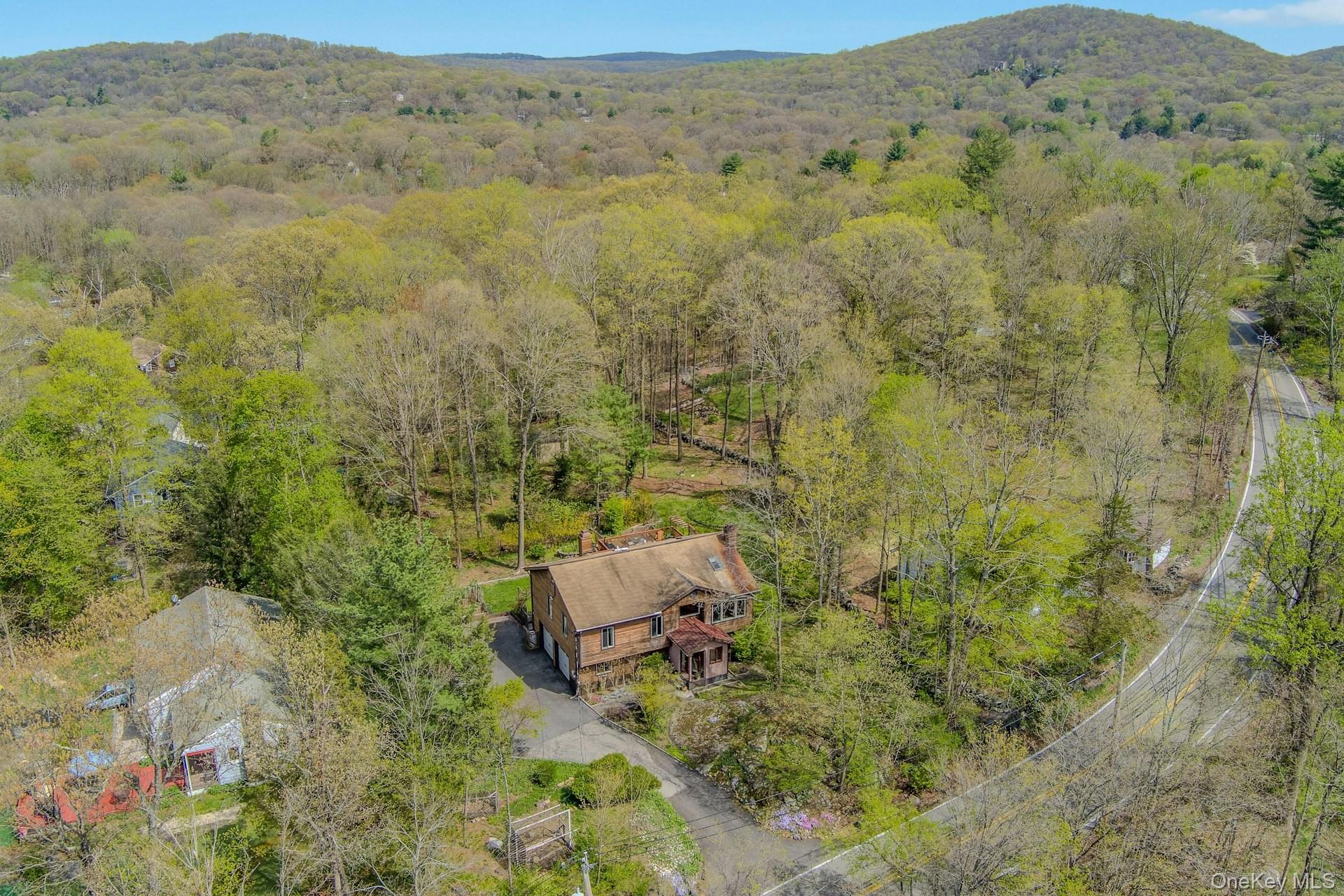 Custom renovated by a master woodworker and set on beautiful property,...