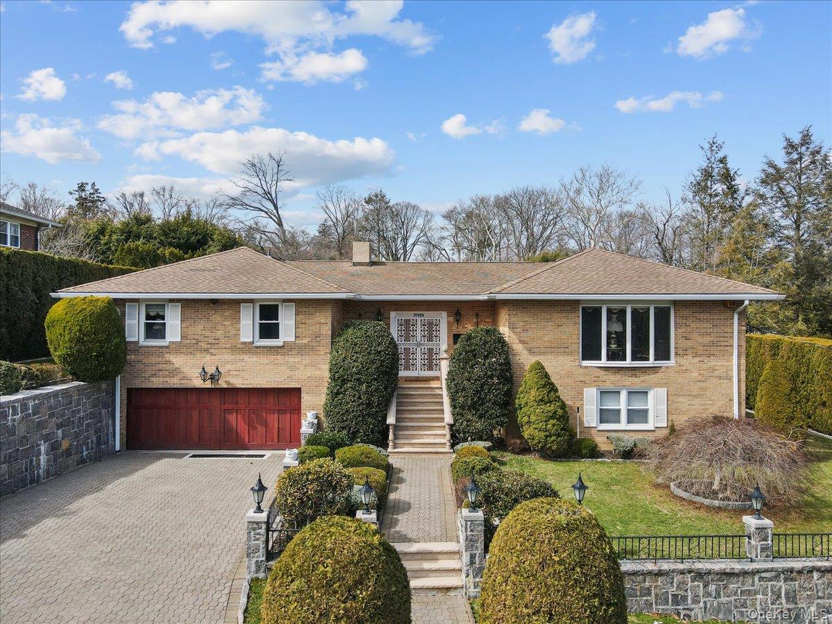 Perfectly situated on just under a third of an acre of lush, manicured...