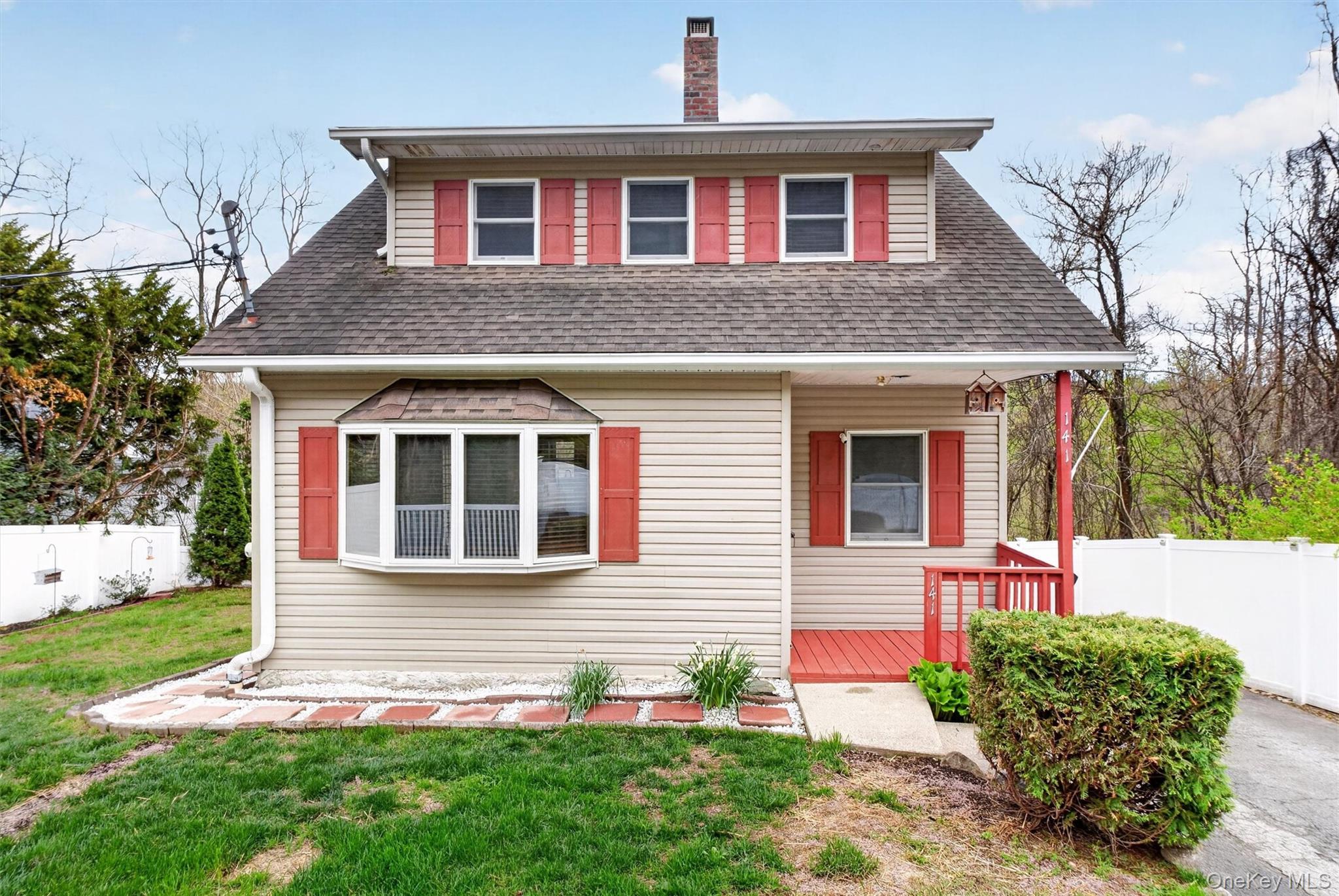 Move-in ready 3-bedroom Cortlandt Manor residence set on a half-acre l...