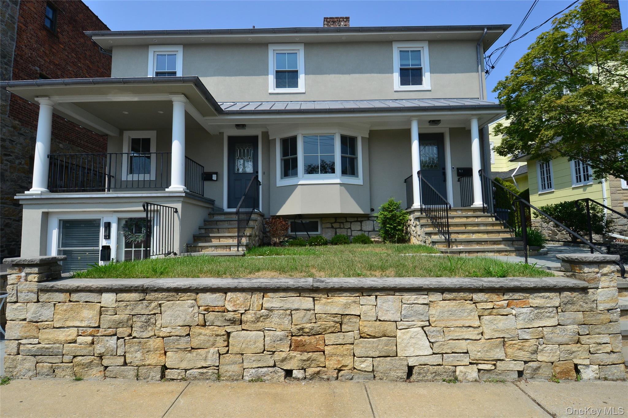 Legal three-family home in prime Eastchester location, completely rebu...