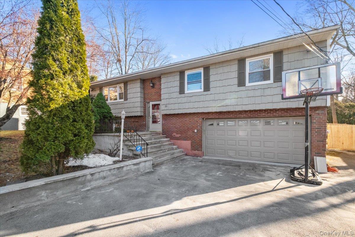 Welcome to 21 Park Avenue—a raised ranch that truly checks every box....