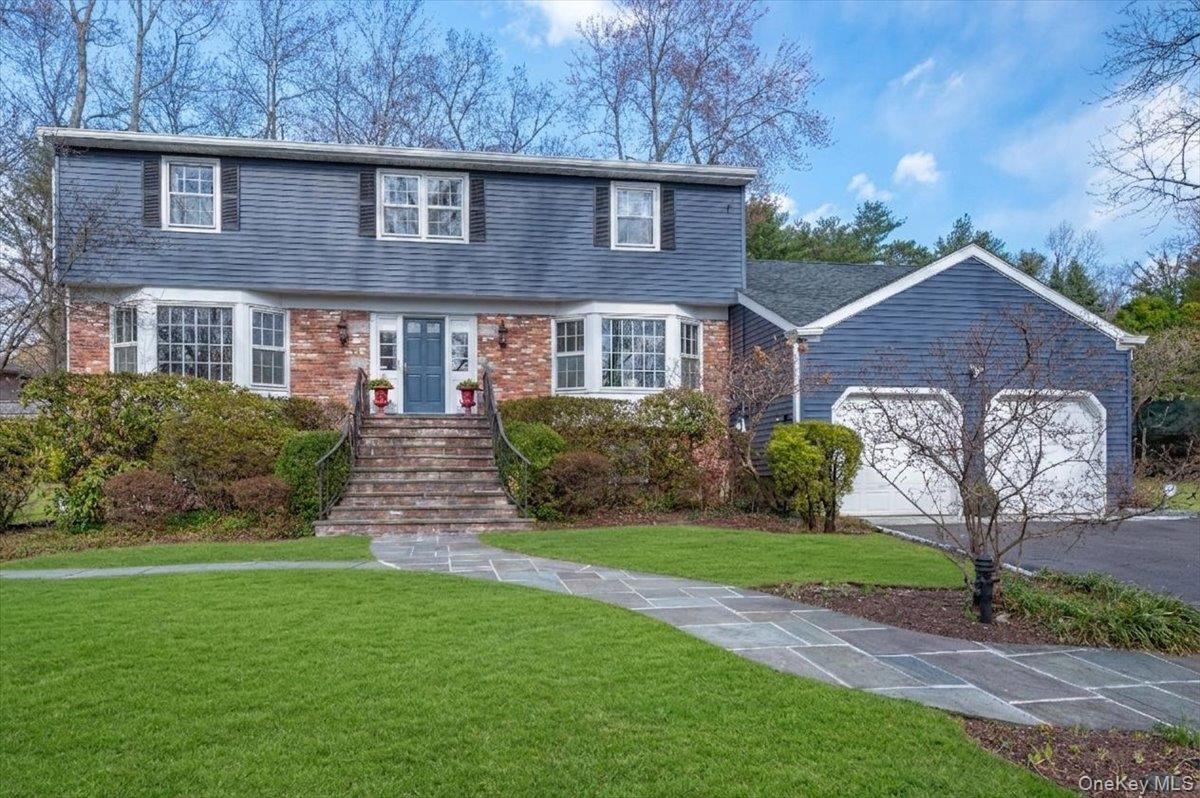 A rare opportunity to enjoy an updated spacious center-hall colonial f...