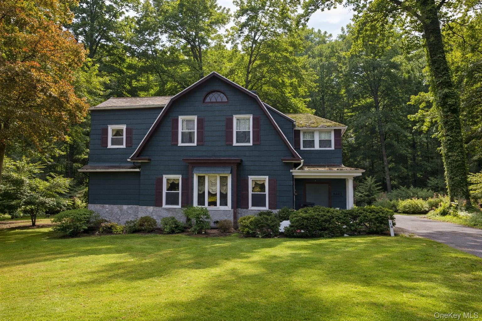 Picture-perfect Dutch Colonial with good bones, a great layout, and be...