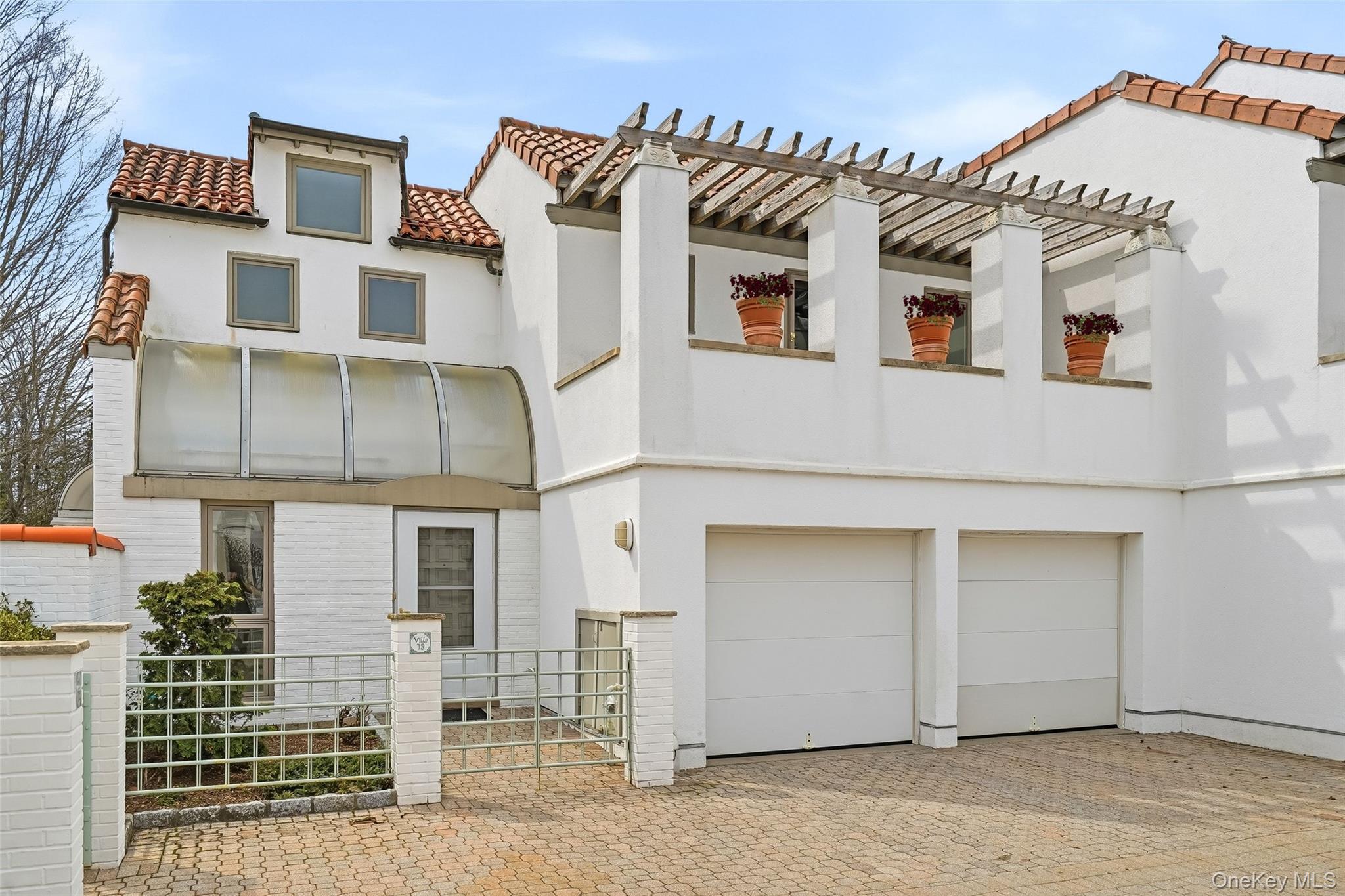 Located in the exclusive enclave of Kassel Court, Residence #13 is ide...