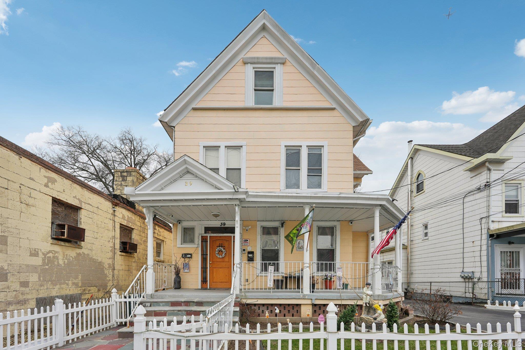 Welcome home to this beautiful well-maintained two family home on a qu...