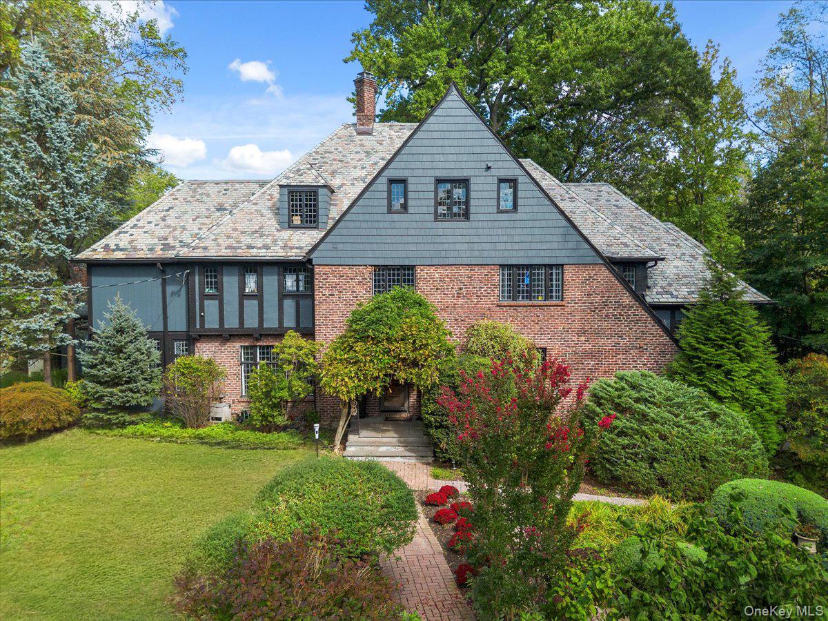 Bright Greenhaven English Tudor offering a true waterfront lifestyle,...