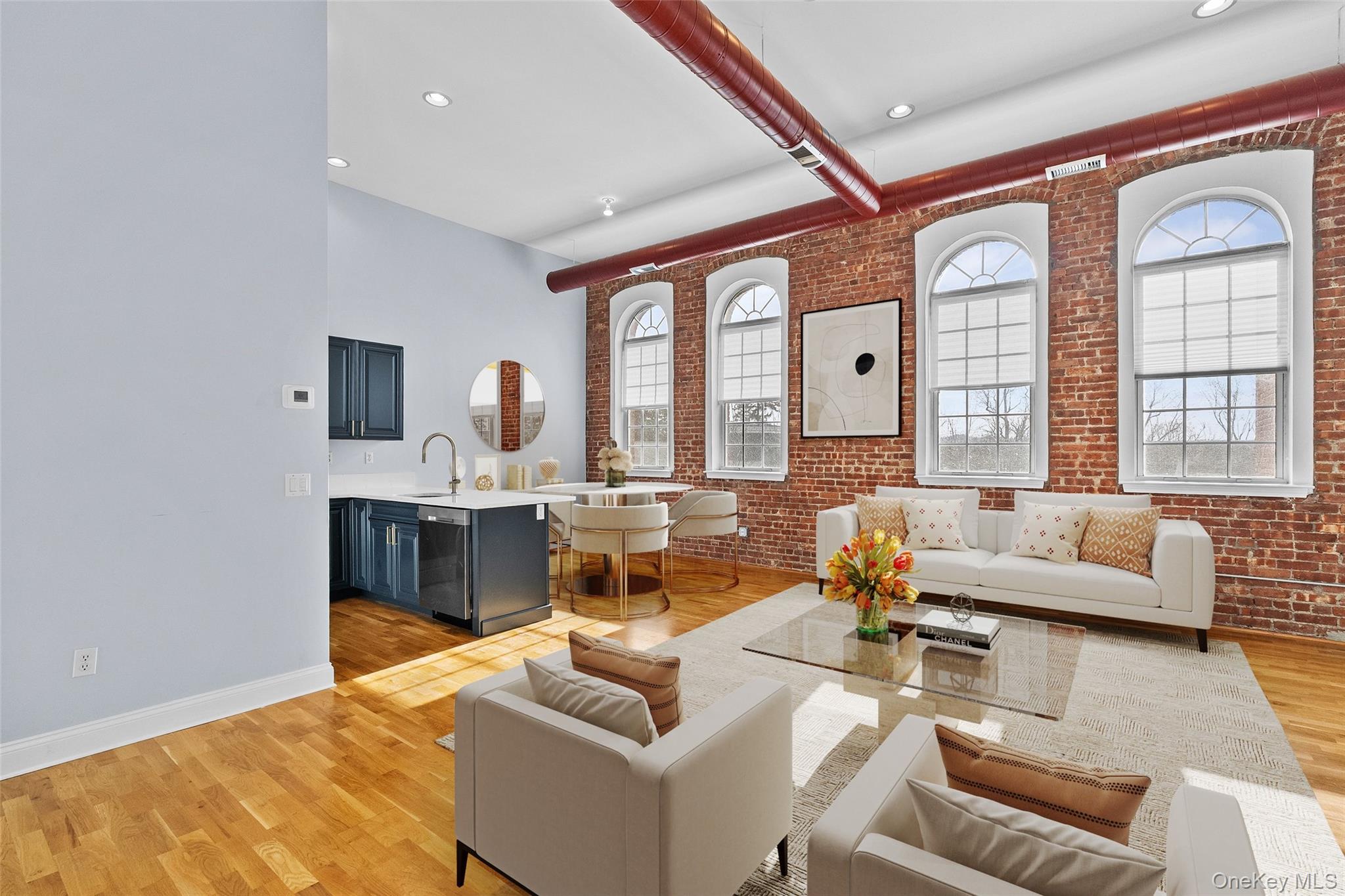 Beautifully renovated loft-style condominium where exposed brick and s...