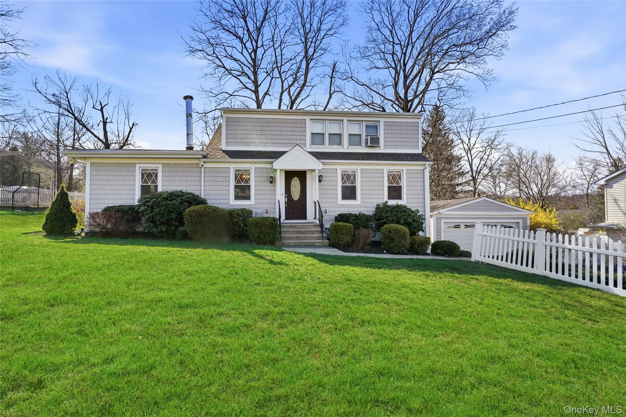 Meticulously maintained three-bedroom Cape on a desirable corner lot,...