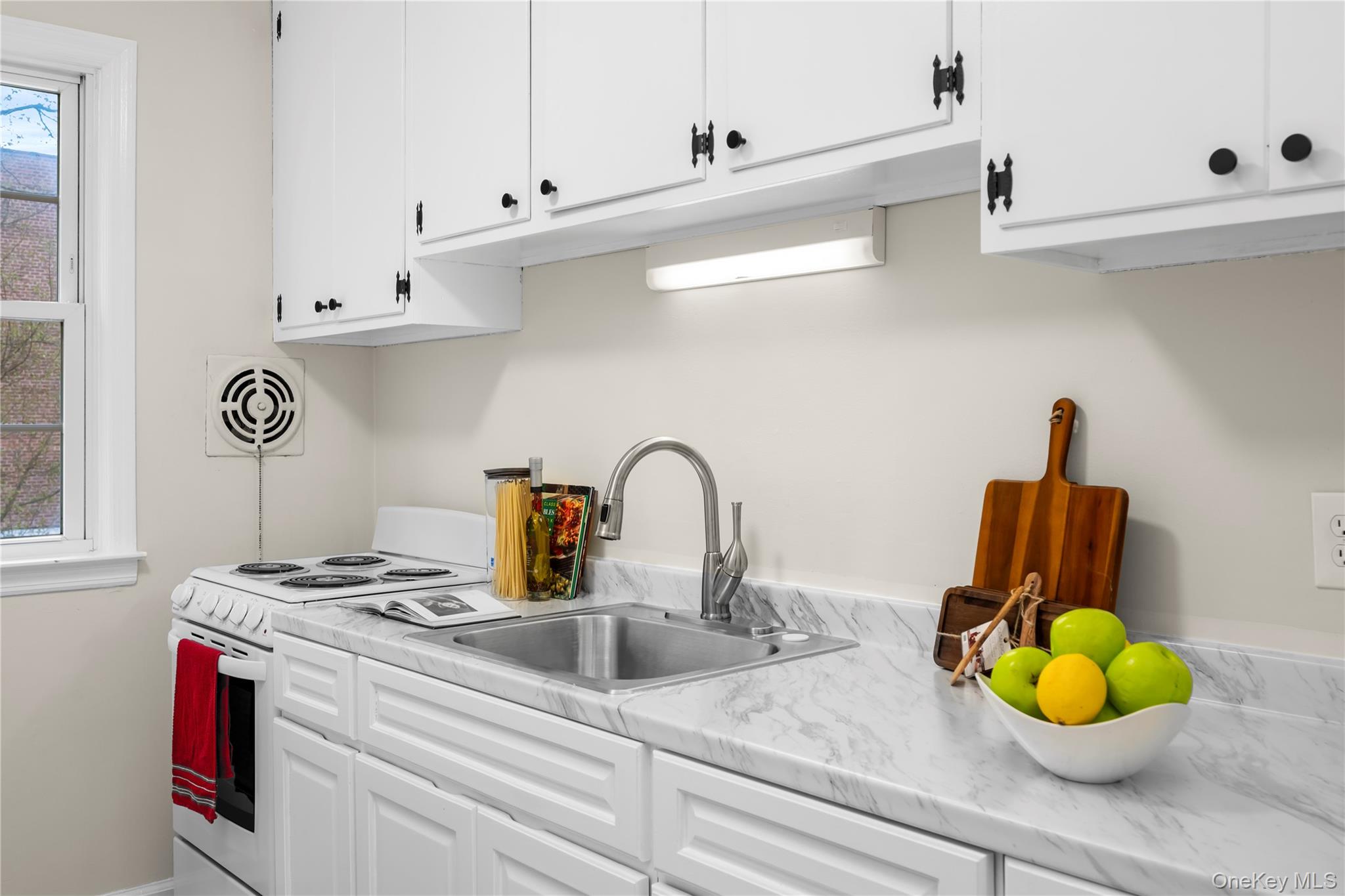 Welcome to this beautifully refreshed one-bedroom co-op in the highly...