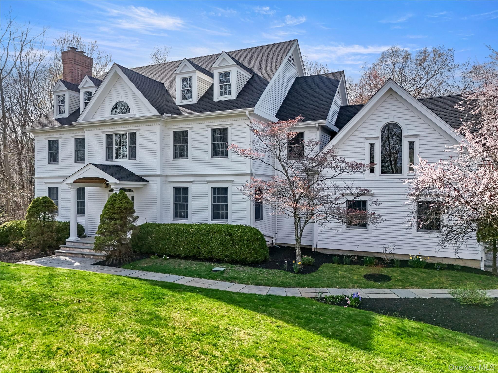 Welcome to 10 Samuel Dann Way, a refreshed, classic center hall Coloni...