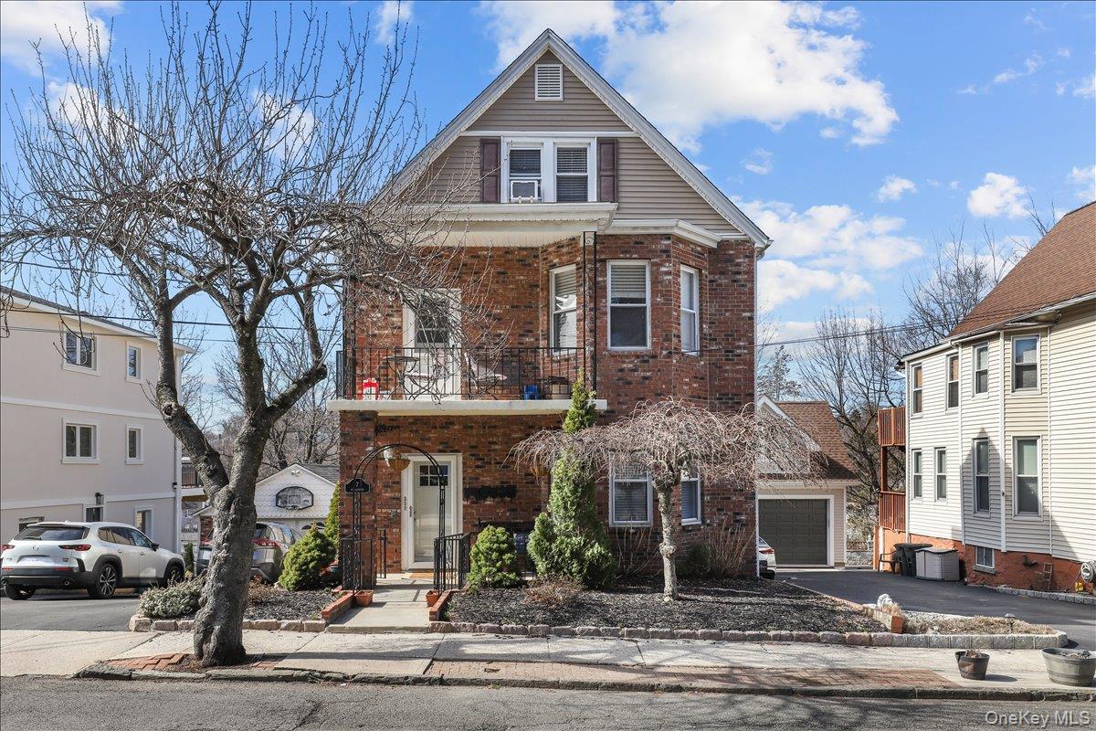 Spacious and inviting third-floor 2-bedroom, 1-bath apartment featurin...