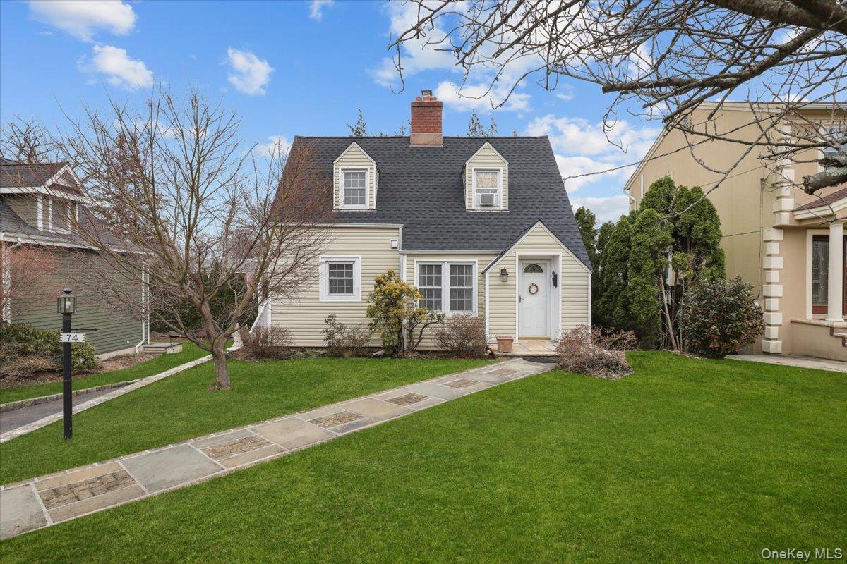 Charming Cape Cod-style home in Eastchester featuring 4 bedrooms and 1...