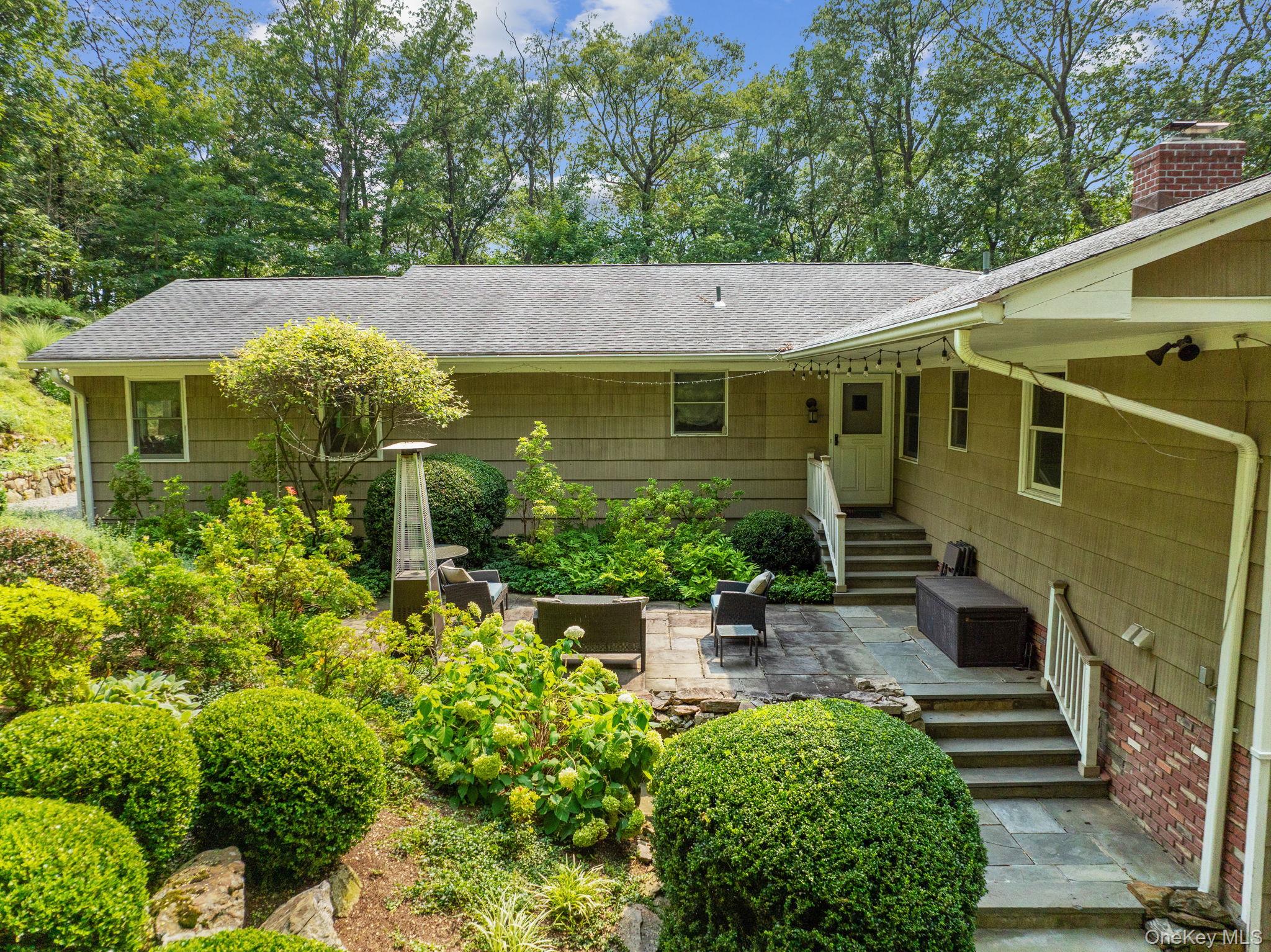 Set privately on 2+ acres at the end of a quiet cul-de-sac, this beaut...