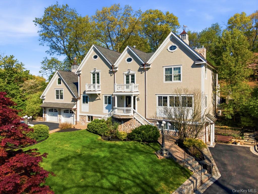 Set on beautifully landscaped grounds in one of Chappaqua’s most covet...