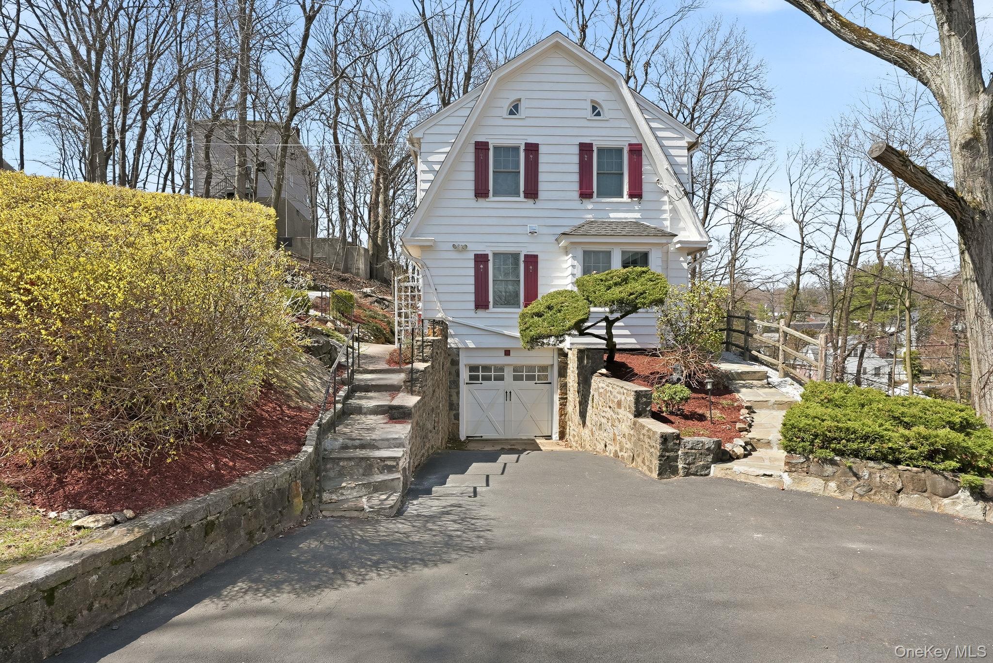 Enchanting, classic Dutch Colonial locatedd in Dobbs Ferry village and...