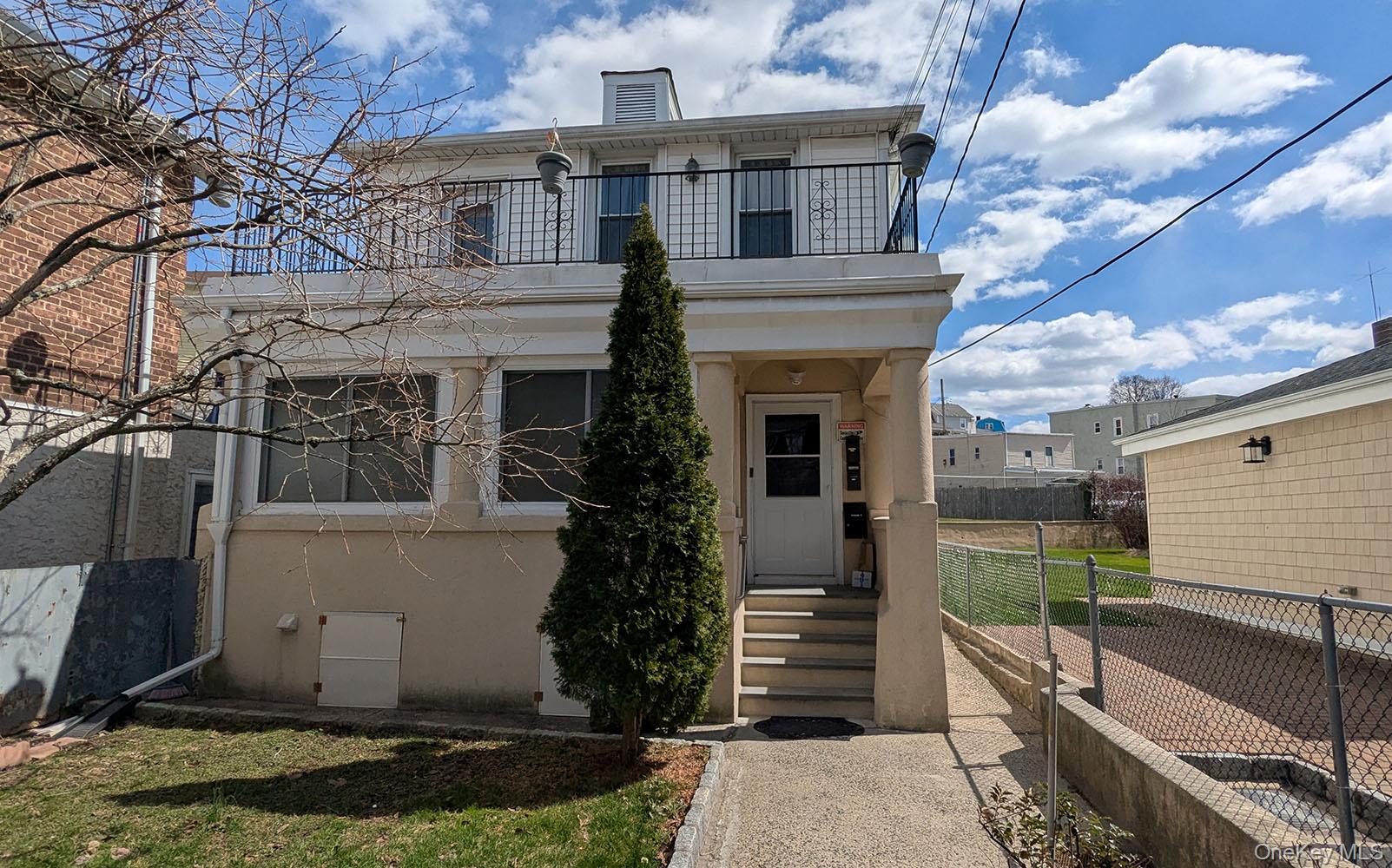 Two Family home in good location offers 5 room plus enclosed porch on...