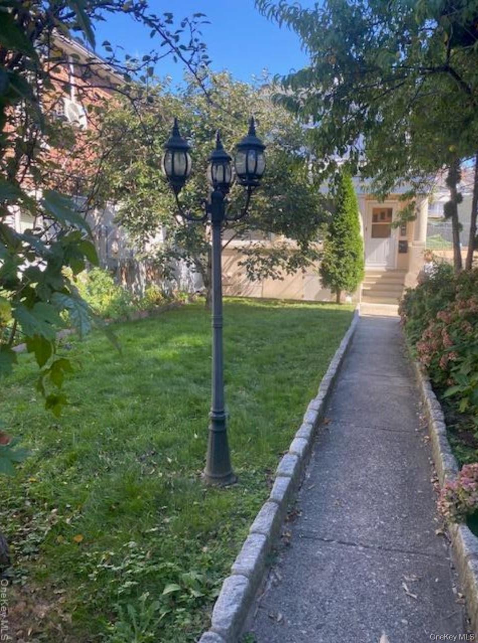 Two Family home in good location offers 5 room plus enclosed porch on...