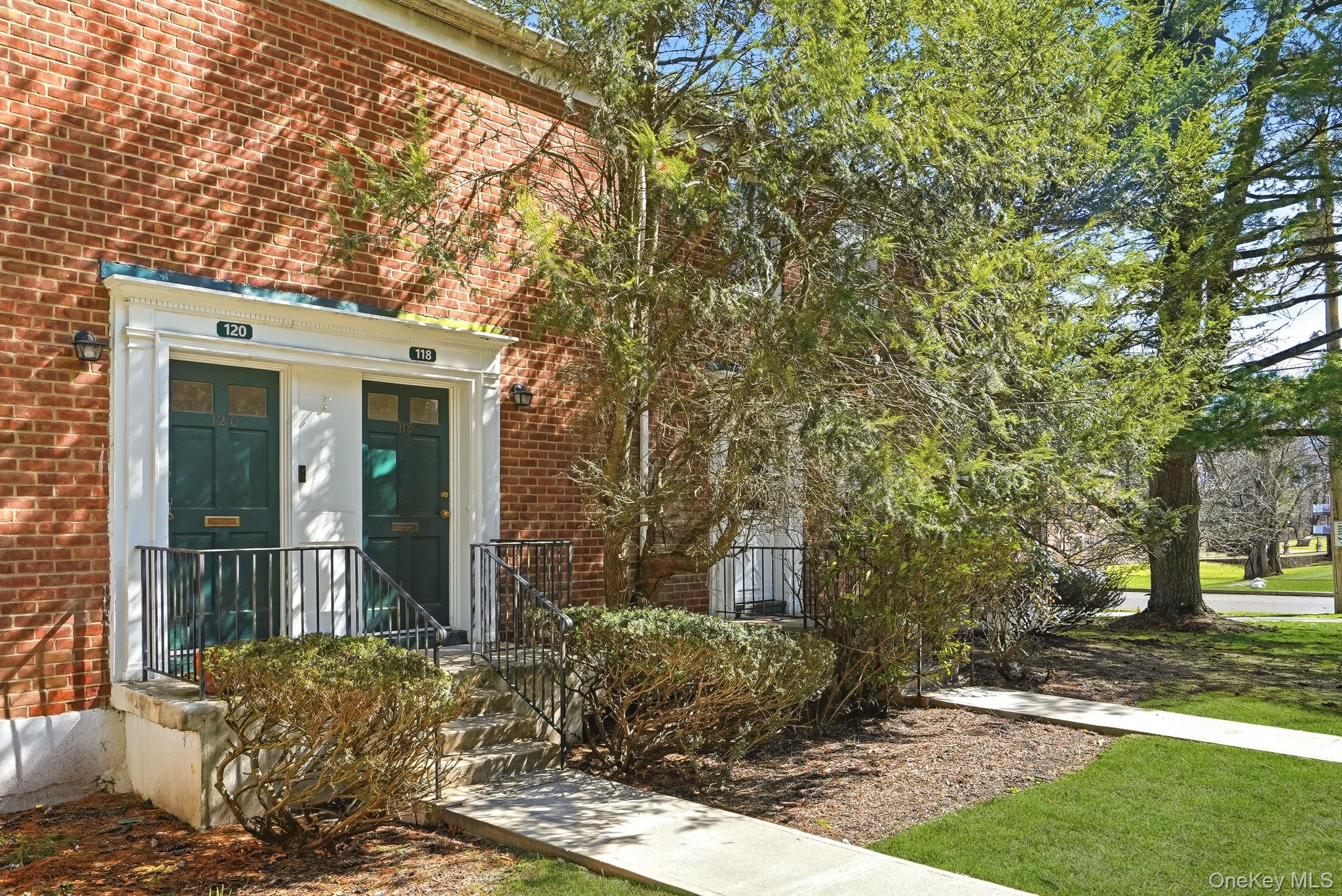 This terrific end-unit co-op with a private entrance has sunny east- a...