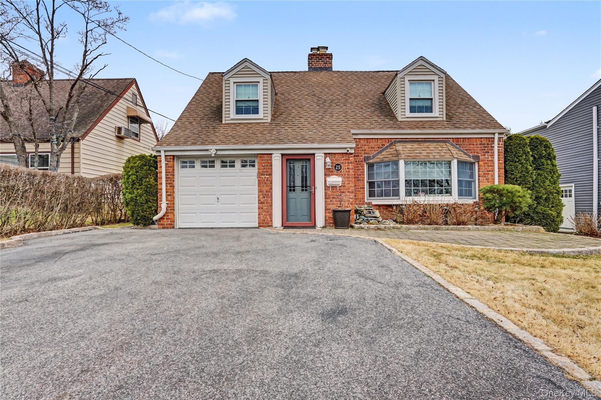 Charming Cape-style home in Eastchester featuring 3 bedrooms, a dedica...