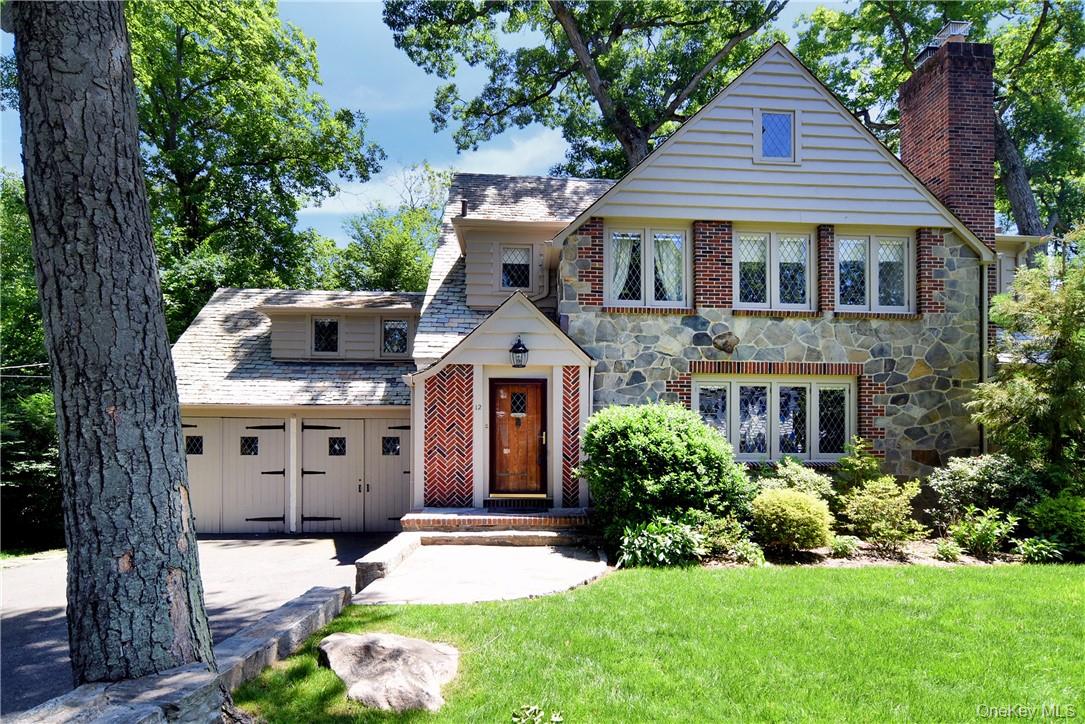 A rare find - a lovingly-maintained Tudor with its original features a...