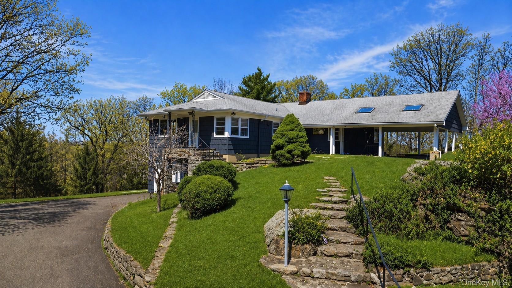 Tucked at the end of a quiet cul-de-sac, this exceptional estate offer...