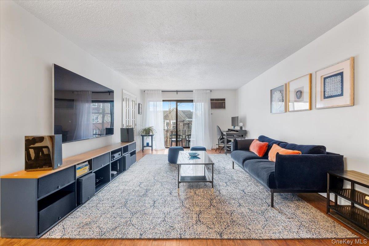 Natural light pours through this spacious and beautifully maintained J...