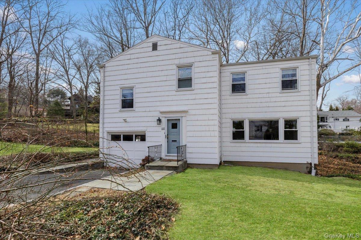 Newly renovated and expanded Colonial set on a picturesque half acre p...