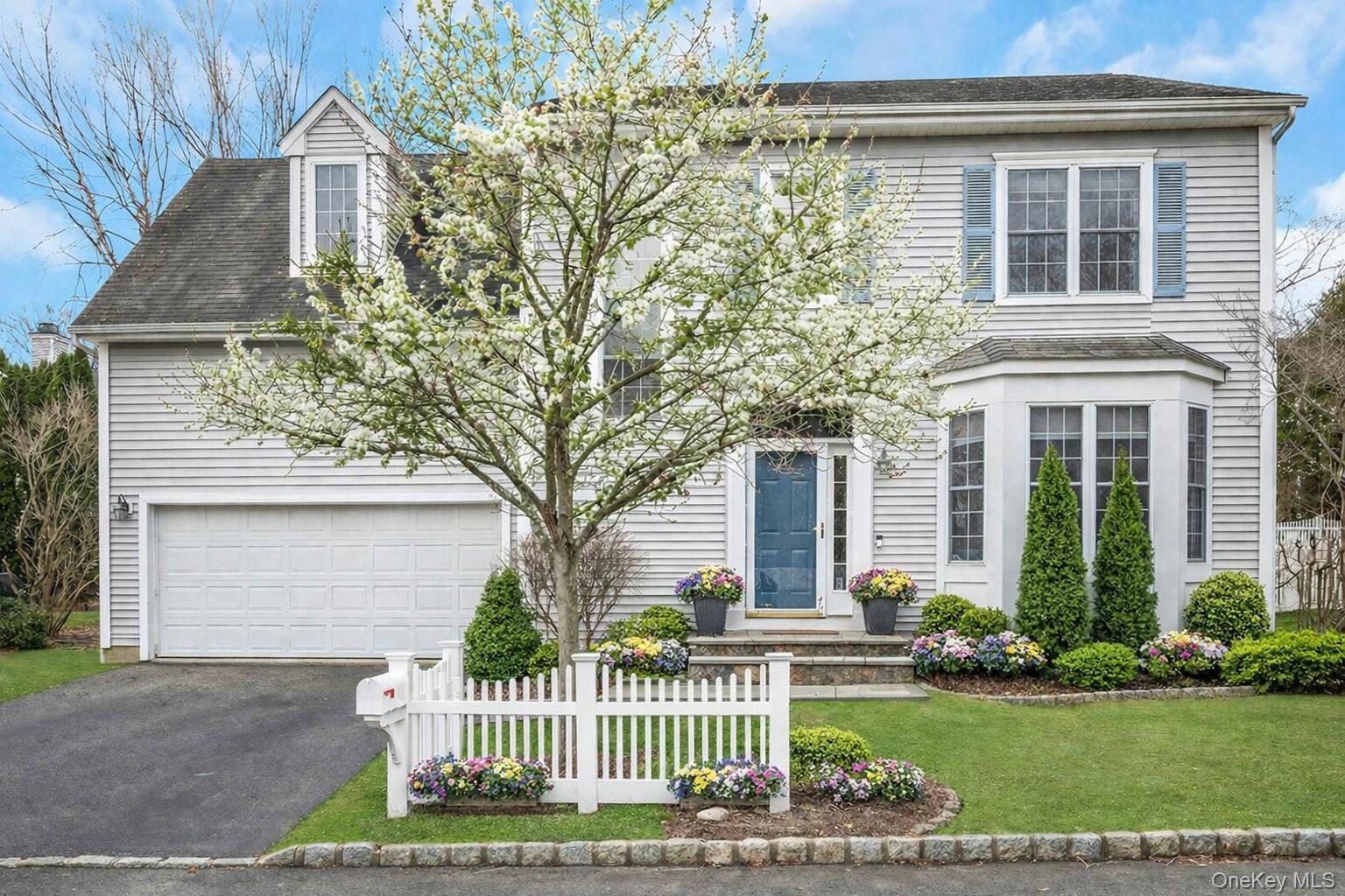 Welcome to this beautifully-sunlit home located in the highly sought-a...