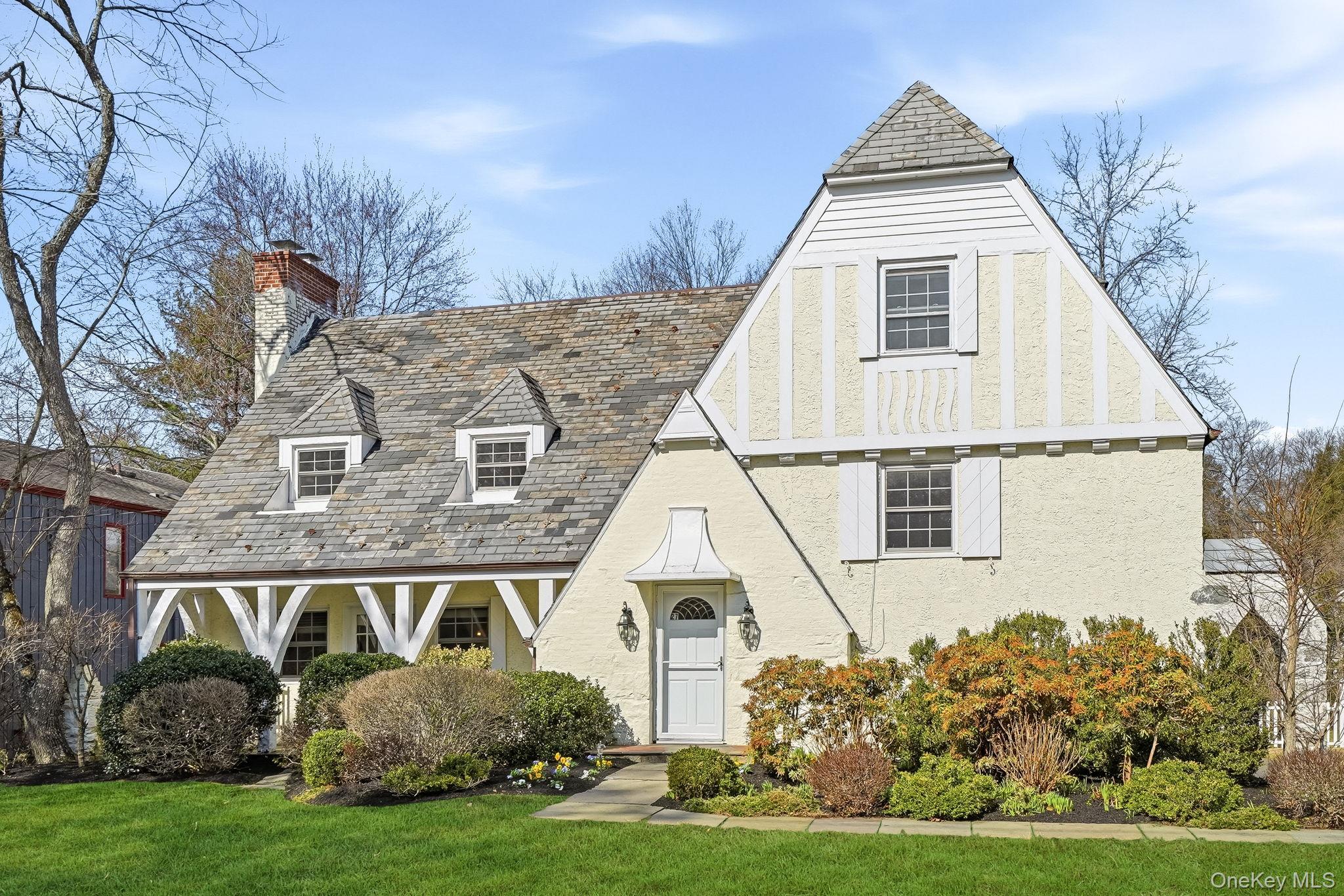 Timeless elegance meets everyday comfort at this classic 1931 Tudor, b...